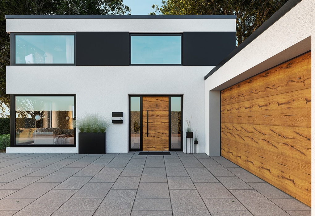 Dzięki powierzchni Duragrain na bramach segmentowych można nadrukować jeden z ponad 30 wzorów imitujących różne materiały lub wykonać indywidualny nadruk, fot. Hörmann