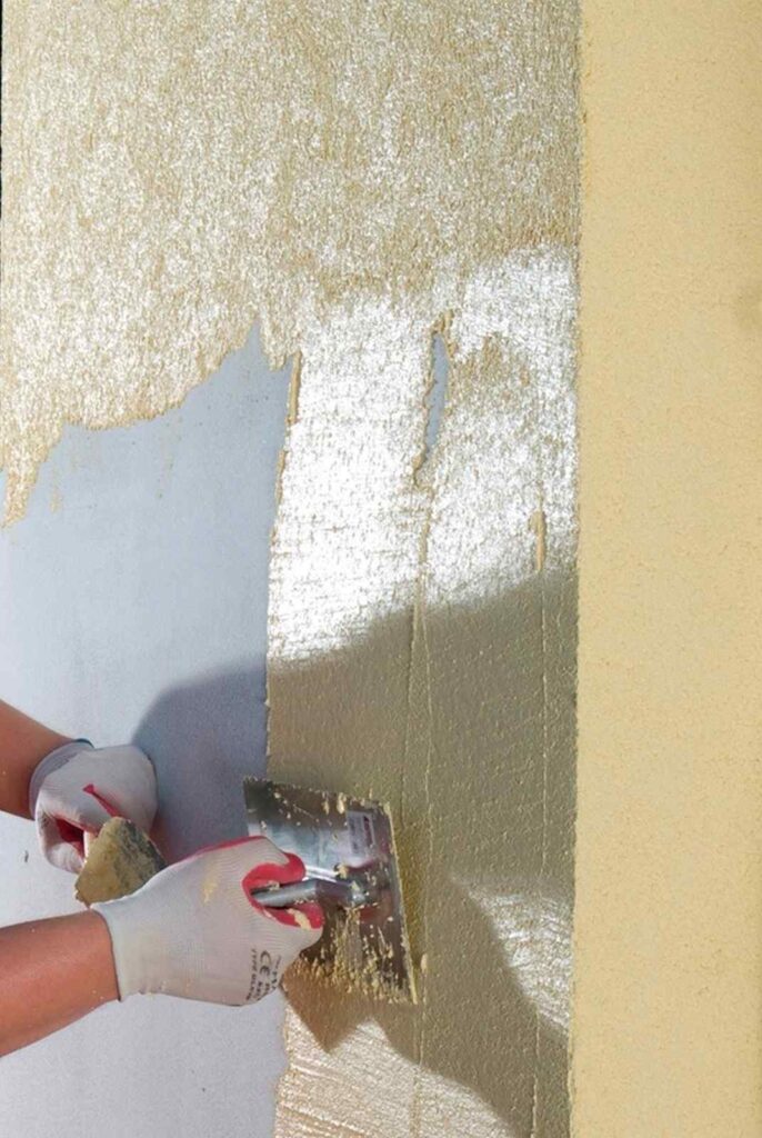 Ocieplanie nakladanie tynku dekoracyjnego, fot. Baumit